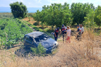 Kontrolünü kaybeden kadın sürücü tarlaya uçtu